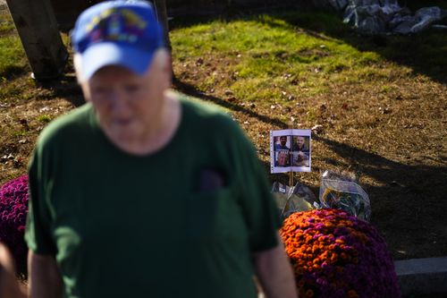 Bill Brackett, who's son Billy was killed at the mass shooting at Schemengees Bar and Grille speaks during an interview in front of a makeshift memorial in Lewiston, Maine, Saturday, October 28, 2023.