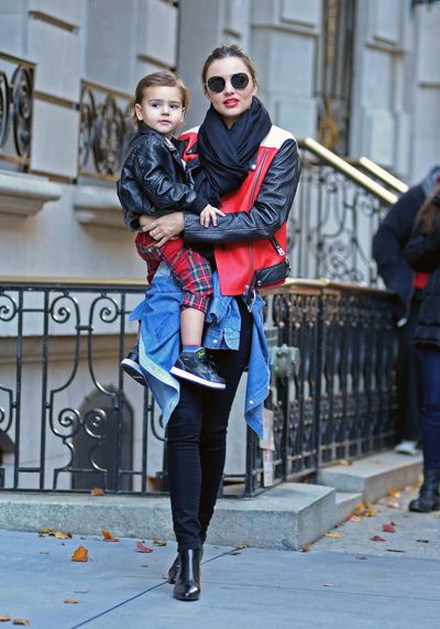 Miranda Kerr's skinny jeans and bomber jacket combo is a fail safe stylish mum go-to. She's with son Flynn in New York this year.