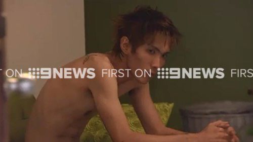 9NEWS crews found the accused in the bedroom of the Brisbane Airbnb property. (9NEWS)