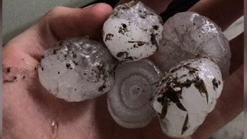 Large hailstones have started to fall across Brisbane. (9NEWS)