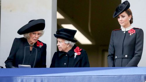 The Duchess of Cornwall, Queen Elizabeth II and the Duchess of Cambridge on a balcony during the remembrance service at the Cenotaph memorial in Whitehall, central London.