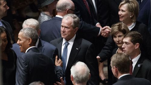 Former President George W Bush was amongst those at the memorial, as was Hilary and Bill Clinton