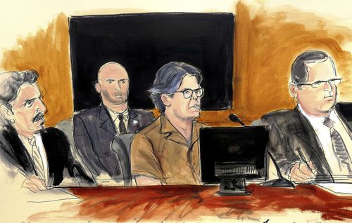 Keith Raniere, second from right, leader of the secretive group NXIVM, attends a court hearing in the Brooklyn borough of New York