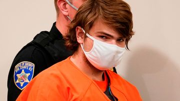 Payton Gendron walks into a US court.