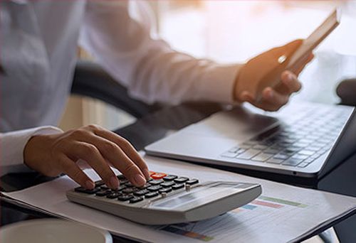 Stock image of woman in home office (Getty)