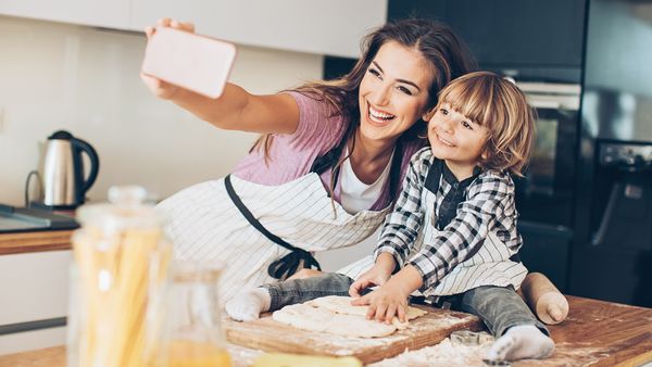 Mums and dads can help fight childhood obesity by modelling healthy behaviours at home. Image: Getty