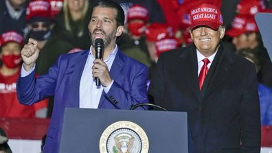 President Donald Trump watches as Donald Trump Jr. speaks at a campaign event at the Kenosha Regional Airport in Kenosha, Wisconsin (Photo: November 2, 2020)