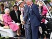 Queen driven around famous flower show in buggy