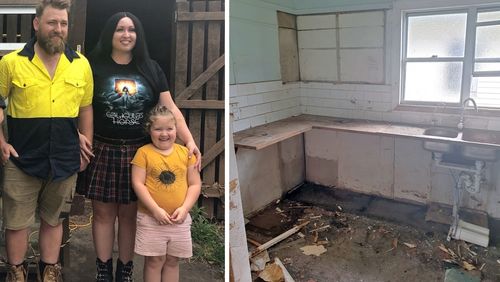 Jenna Breeze, pictured with her husband Shannon and their daughter. Their home (right) is still gutted and empty 12 months on from the floods. 