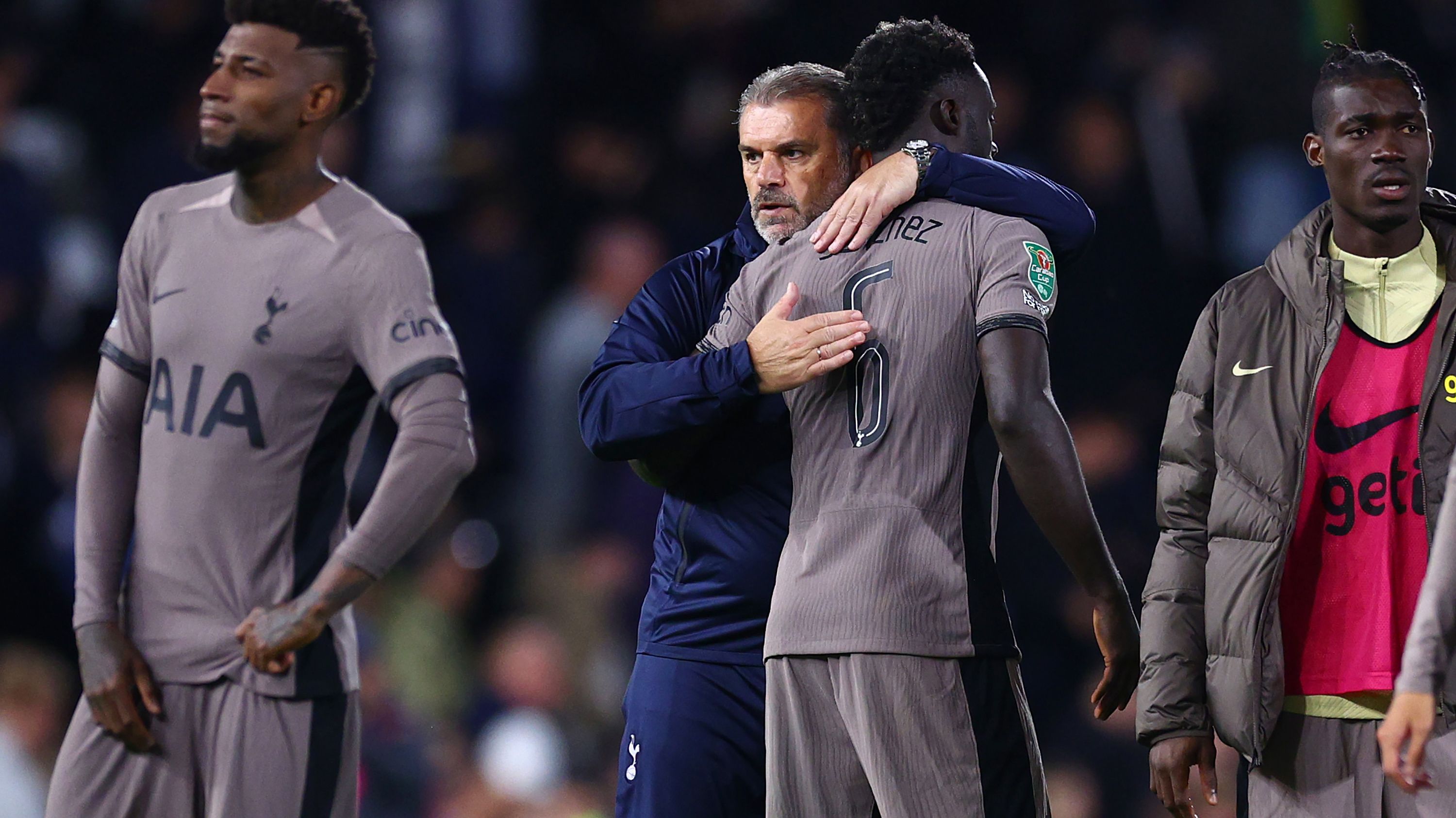 Ange Postecoglou, manager of Tottenham Hotspur, consoles Davinson Sanchez.