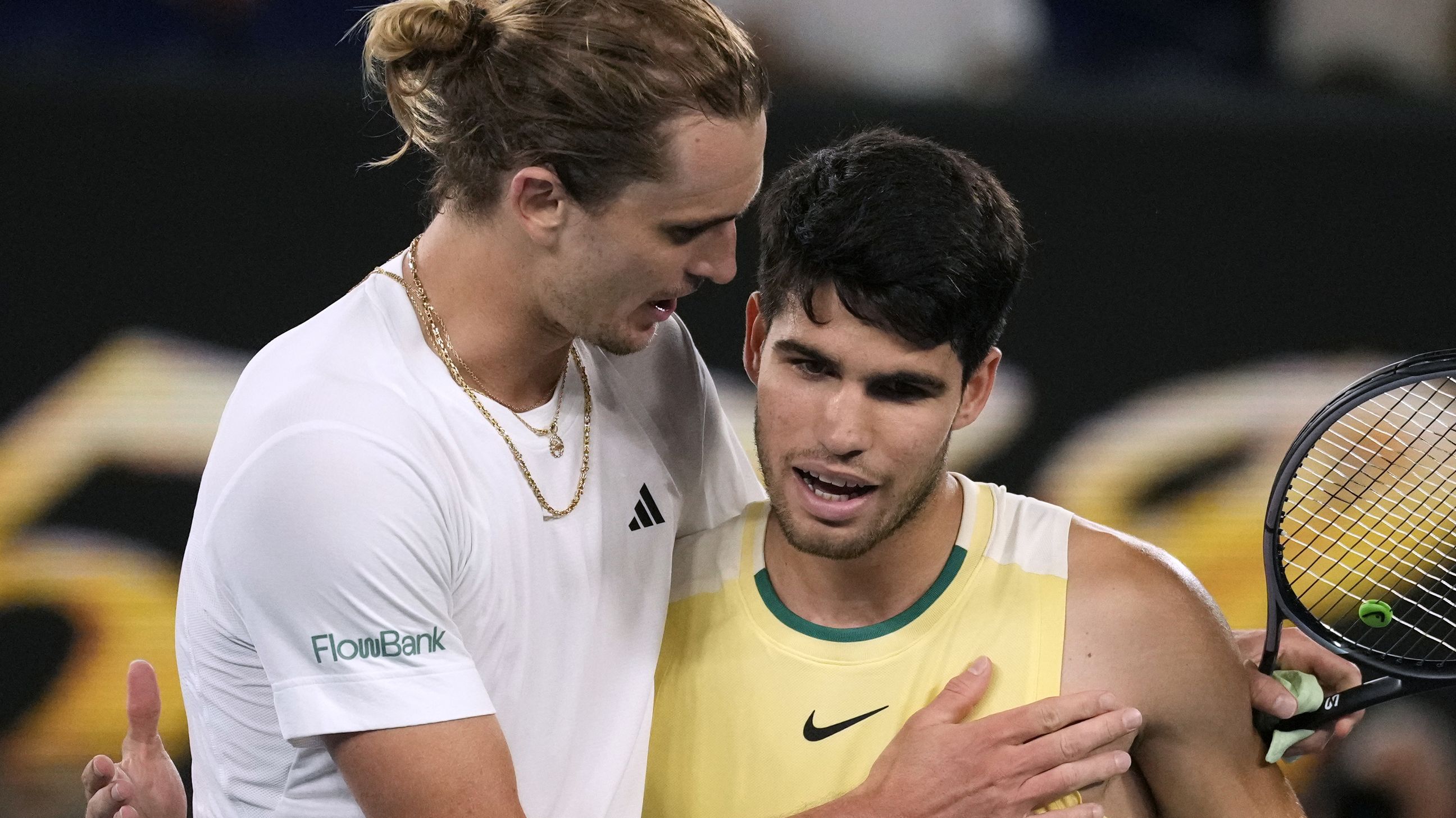 Alexander Zverev, left, of Germany is congratulated by Carlos Alcaraz of Spain following their quarterfinal match at the Australian Open.