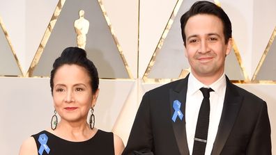 Why Are Celebrities Wearing Blue Ribbons at the Oscars?