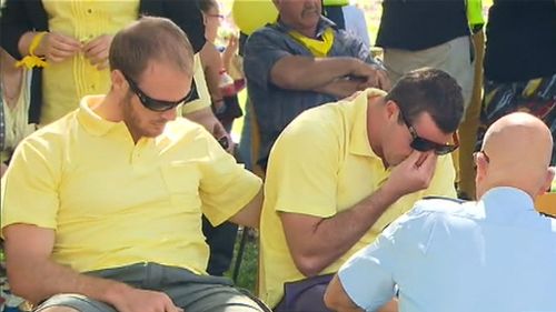 Aaron Leeson-Woolley, supported by mates and family. (9NEWS)