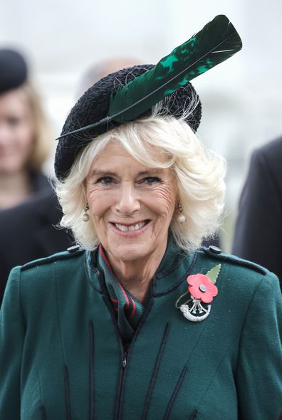 Camilla, Queen Consort smiles as she attends the 94th Year of The Field Of Remembrance at Westminster Abbey on November 10, 2022 in London