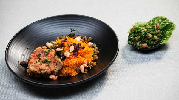 The Shahrouk's lamb kabsa with tomato salsa, tri colour rice and tabouli