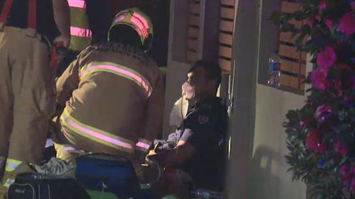A firefighter was treated for exhaustion and three other neighbours, who were forced to evacuate their properties due to the smoke, were also taken to hospital. Picture: 9NEWS.