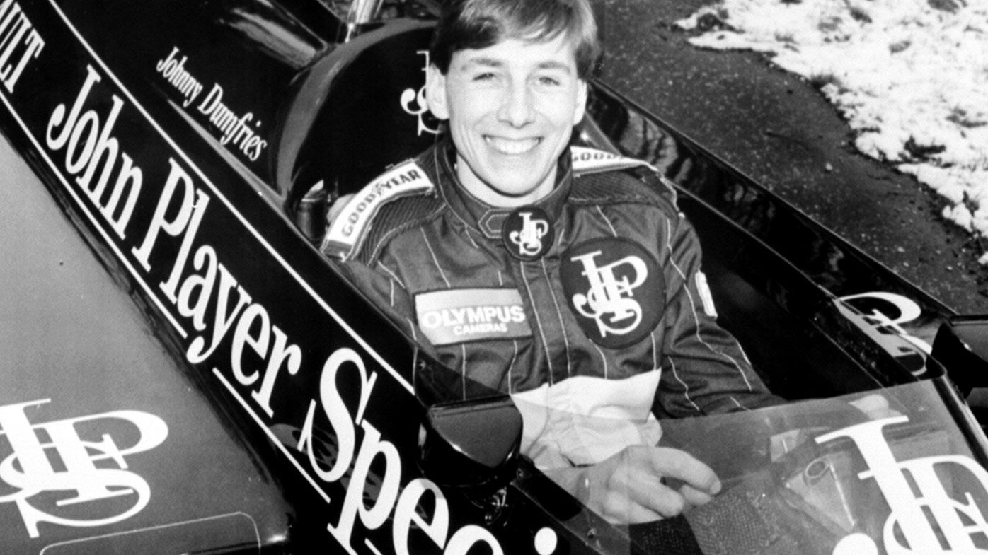 Johnny Dumfries, who has died at 62, pictured in his Lotus Formula One car in 1986.