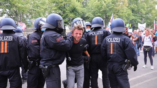 Coronavirus skeptics and right-wing extremists march in protest against coronavirus-related restrictions and government policy on August 29, 2020 in Berlin, Germany.