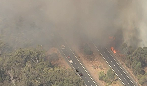 The large fire was travelling from Phillips Road in Grantham and has now crossed the Warrego Highway. 