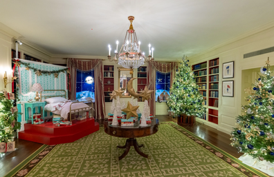The White House library is decorated with a kids' bedroom and Santa in the window.