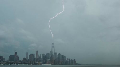 A photo of lightning striking the One World Trade Centre. (@AnthonyQuintano)
