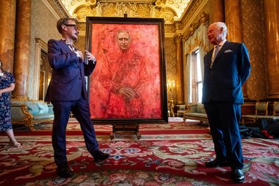 Artist Jonathan Yeo and King Charles III at the unveiling of artist Yeo's portrait of the King, in the blue drawing room at Buckingham Palace, London.
