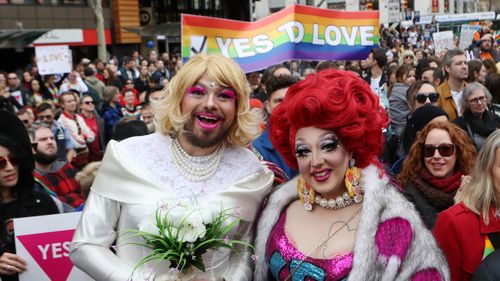 Supporters join in the marriage equality rally in Melbourne. Saturday, August 26, 2017. (AAP)