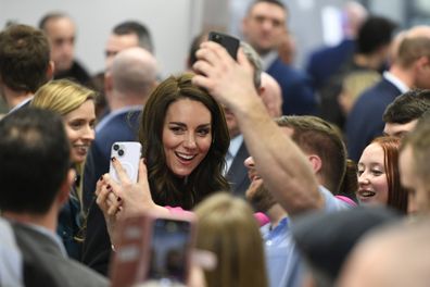 Catherine, Princess of Wales poses for a selfies as she visit the Royal Liverpool University Hospital with Prince William, Prince of Wales (not pictured) on January 12, 2023 in Liverpool, England