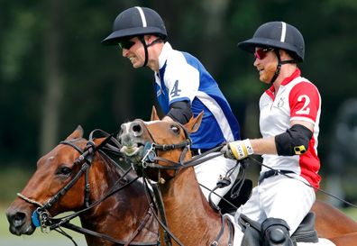 William and Harry battle it out at the polo in 2019.