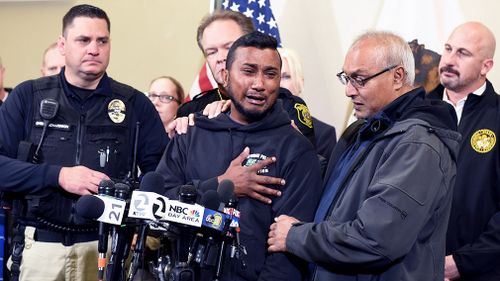 Sheriff Christianson called for stricter laws at a news conference as Cpl Singh's brother wept beside him.