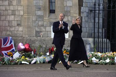Prince Edward and Sophie, Countess of Wessex, wave to mourners outside the Windsor Castle in Windsor, England, Friday, September 16, 2022.