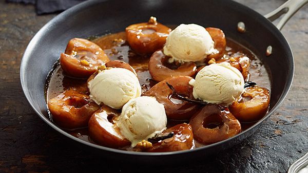 Roasted pear with salted caramel sauce, walnuts and vanilla ice-cream