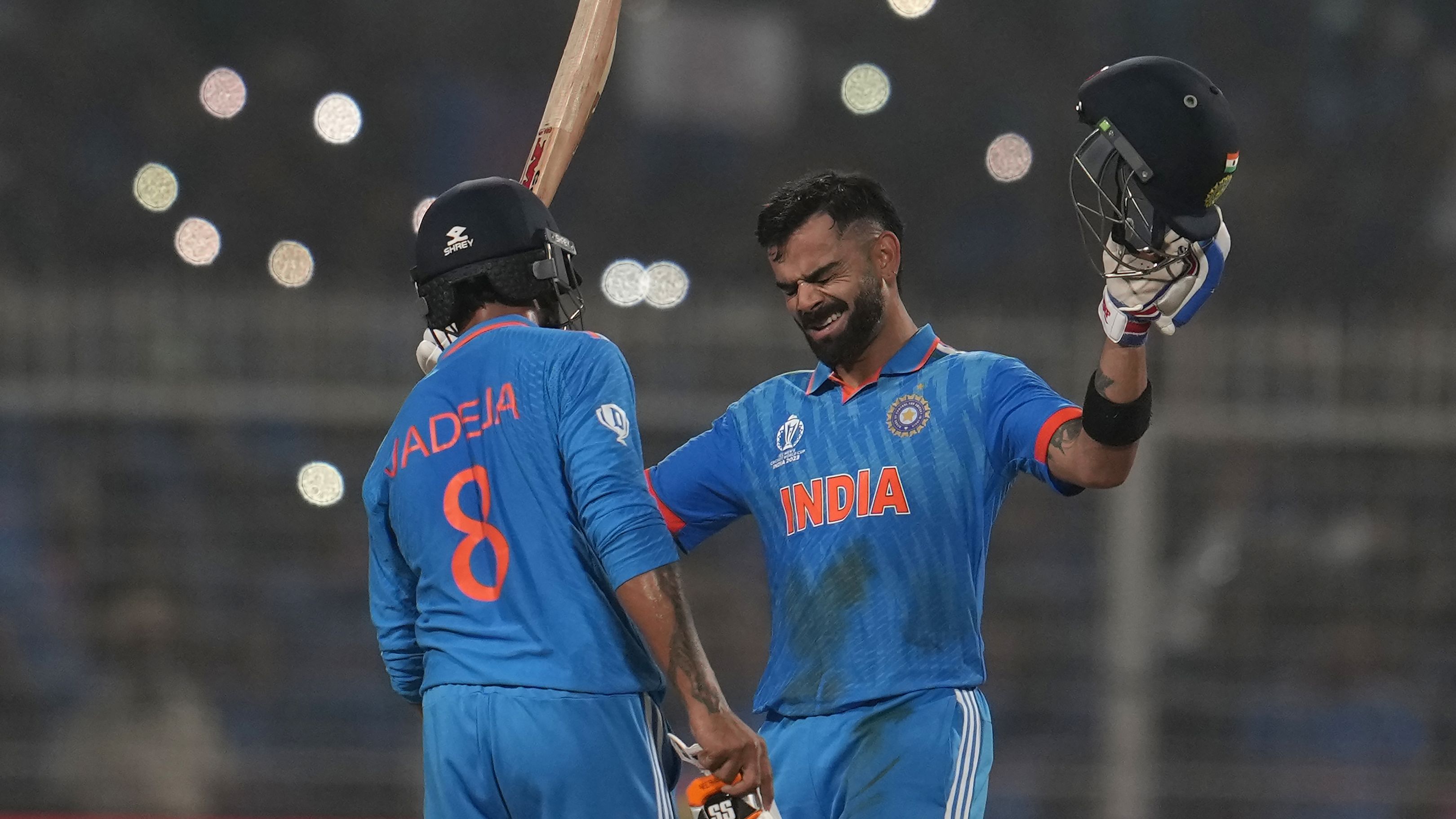 India&#x27;s Virat Kohlpi reacts as he celebrates scoring a century during the ICC Men&#x27;s Cricket World Cup.