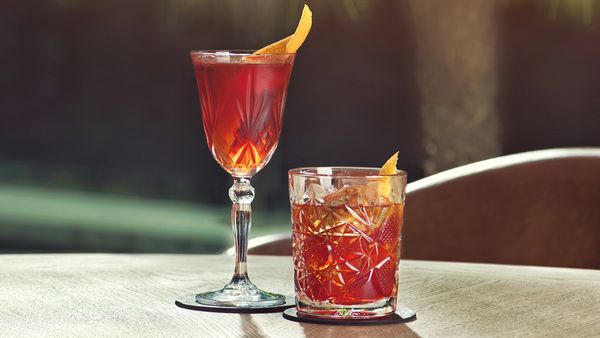 Negroni classic and Negroni sbagliato coctails, on the table