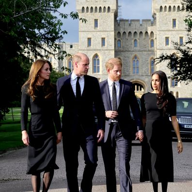 Catherine, Princess of Wales, Prince William, Prince of Wales, Prince Harry, Duke of Sussex, and Meghan, Duchess of Sussex on the long Walk at Windsor Castle arrive to view flowers and tributes to HM Queen Elizabeth on September 10, 2022 in Windsor, England. Crowds have gathered and tributes left at the gates of Windsor Castle to Queen Elizabeth II, who died at Balmoral Castle on 8 September, 2022. (Photo by Chris Jackson - WPA Pool/Getty Images)