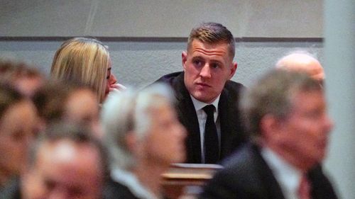 American Football player J.J. Watt arrives before the funeral service.