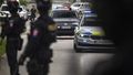 Policemen guard the area as convoy brings the suspect, in shooting of Slovakia&#x27;s Prime Minister Robert Fico, to court in Pezinok, Slovakia, Saturday, May 18, 2024.