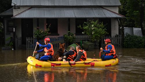 SES rescue Windsor residents as their homes become isolated and inundated as the Hawkesbury River floods.