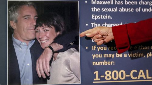 Audrey Strauss, acting U.S. attorney for the Southern District of New York, points to a photo of Jeffrey Epstein and Ghislaine Maxwell, during a news conference in New York on July 2, 2020.