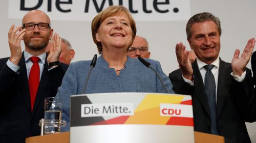 Merkel looks for coalition partners
