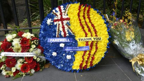 Wreaths were laid in front of Scots' Church ahead of former prime minister Malcolm Fraser's funeral in Melbourne. (AAP)