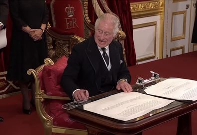 King Charles shoos pen tray away at royal proclamation
