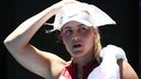 Marta Kostyuk of Ukraine cools down in her third round singles match against Paula Badosa of Spain during day five of the 2022 Australian Open at Melbourne Park.