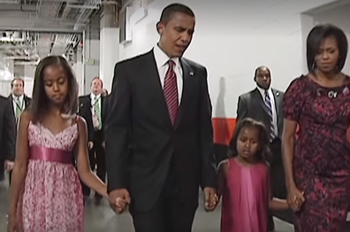 Michelle and Barrack Obama with daughters younger