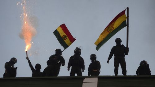 Police who were against the reelection of President Evo Morales protest in Cochabamba, Bolivia on November 8, 2019. Opposing sides in Bolivia's protested over the legitimacy of Morales' claimed re-election, as dissension appeared to be spreading among police forces across the country.