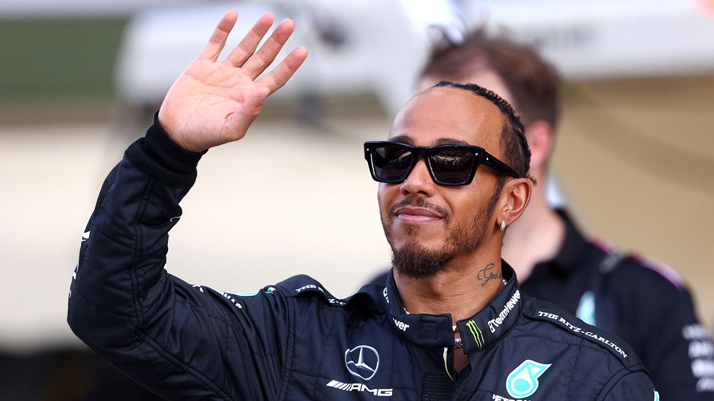 Lewis Hamilton of Great Britain and Mercedes looks on in the Paddock during previews ahead of the F1 Grand Prix of Abu Dhabi at Yas Marina Circuit on November 23, 2023 in Abu Dhabi, United Arab Emirates. (Photo by Clive Rose/Getty Images)