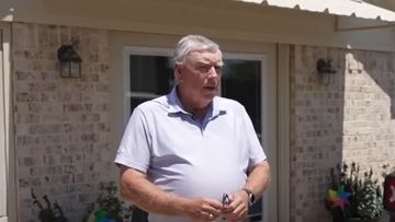 Jim Moore outside his home in central Texas.