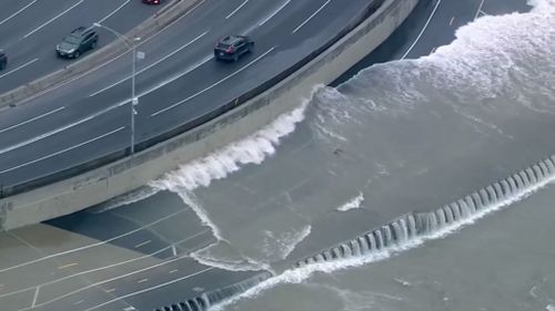 Strong winds were kicking the one degree water up from Lake Michigan. (ABC-7 Chicago)