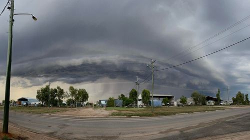 It's now Queensland's turn to brace for wet weather with severe storms broadcast for roughly half the state. Photographer Rhiannon McQueen snapped this photo of a storm cell as it bore down on the outback town of Winton. 