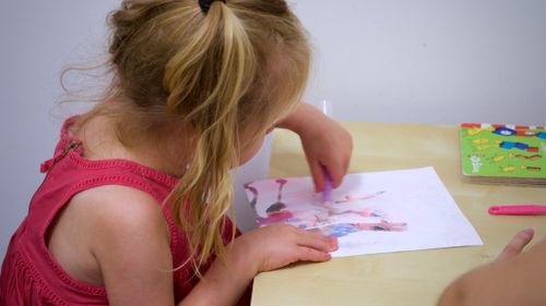 The girls participate in a range of activities as part of therapy including, song, dance, drawing and storytelling. (Ehsan Knopf/9NEWS)